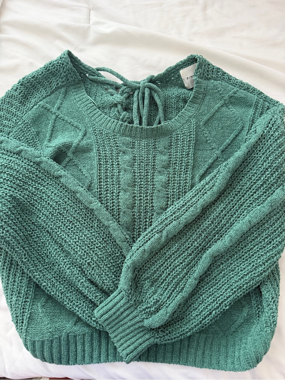 Pink Rose teal cable knit crewneck sweater with tie-back